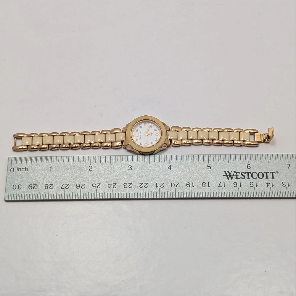 Armitron Now Womens Rose Gold Tone Cream Ceramic Bezel Watch 753896RG Untested